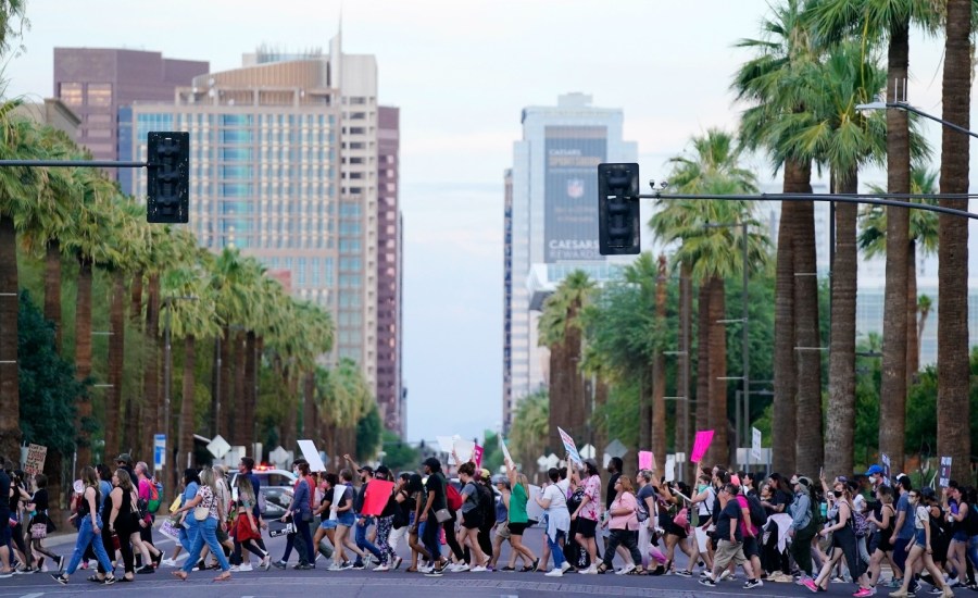 Protestors in Phoenix, Arizona line the streets after the Supreme Court overturned Roe v. Wade on June 24, 2022.