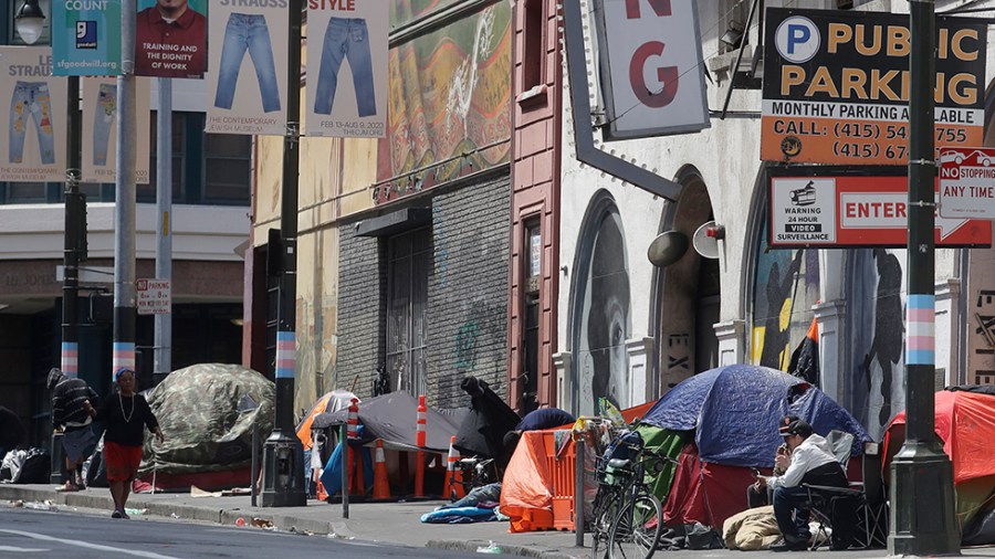 Tents line a sidewalk in San Francisco