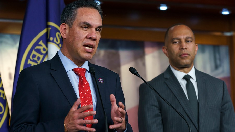 Reps. Pete Aguilar (D-Calif.) and Hakeem Jeffries (D-N.Y.) address reporters after a closed-door Democratic caucus meeting on Tuesday, June 14, 2022.