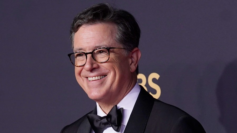 Stephen Colbert smiles after winning an Emmy.