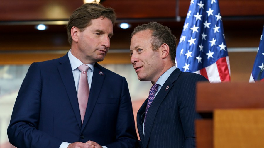Rep. Dean Phillips (D-Minn.) speaks to Rep. Josh Gottheimer (R-N.J.) during a press conference on Wednesday, June 15, 2022 to discuss the Lower Food and Fuel Costs Act.