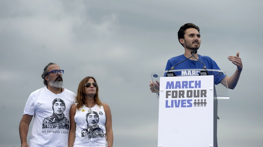 Patricia and Manuel Oliver, parents of Parkland victim Joaquin Oliver, look on as Parkland survivor David Hogg speaks during a March For Our Lives rally against gun violence on the National Mall in Washington, D.C., on Saturday, June 11, 2022.