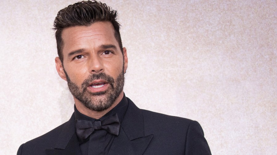 Ricky Martin poses for photographers upon arrival at the amfAR Cinema Against AIDS benefit at the Hotel du Cap-Eden-Roc in France.