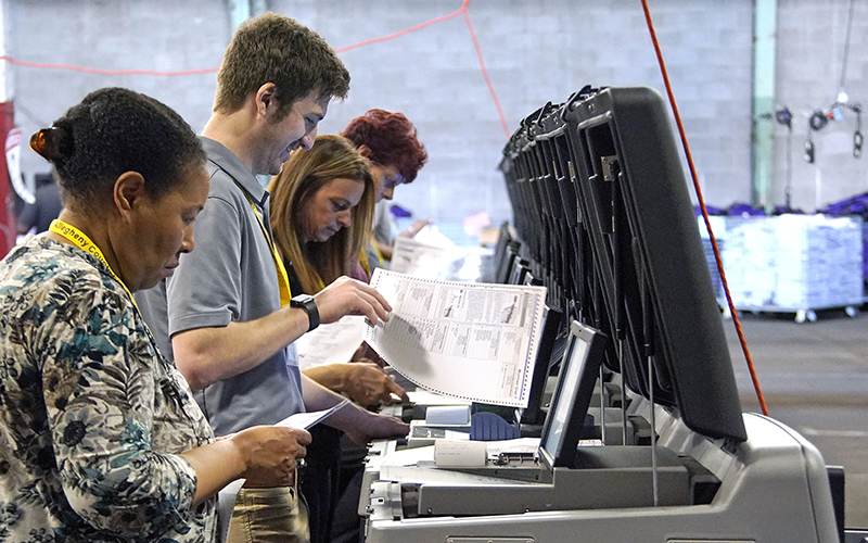 Election workers recount ballots