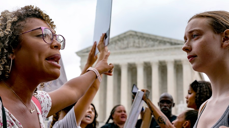 Protesters for and against abortion demonstrate outside the Supreme Court on Monday, June 27, 2022 in the aftermath of its decision to overturn Roe v. Wade.