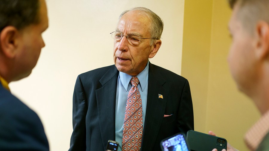 Sen. Chuck Grassley (R-Iowa) speaks to reporters as he arrives to the Capitol for procedural votes regarding the nomination of Federal Reserve Board Member nominee Michael Barr on Wednesday, July 13, 2022.