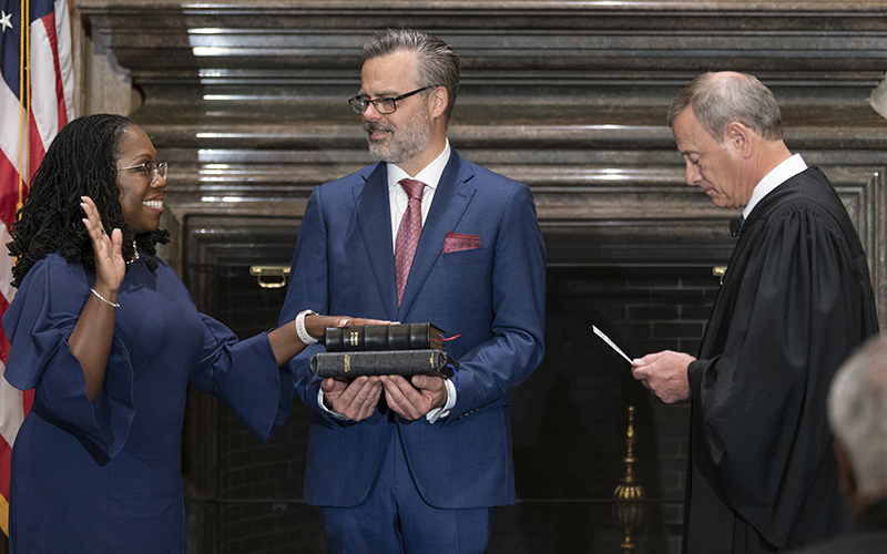 Supreme Court Chief Justice John Roberts administers the constitutional oath to Justice Ketanji Brown Jackson