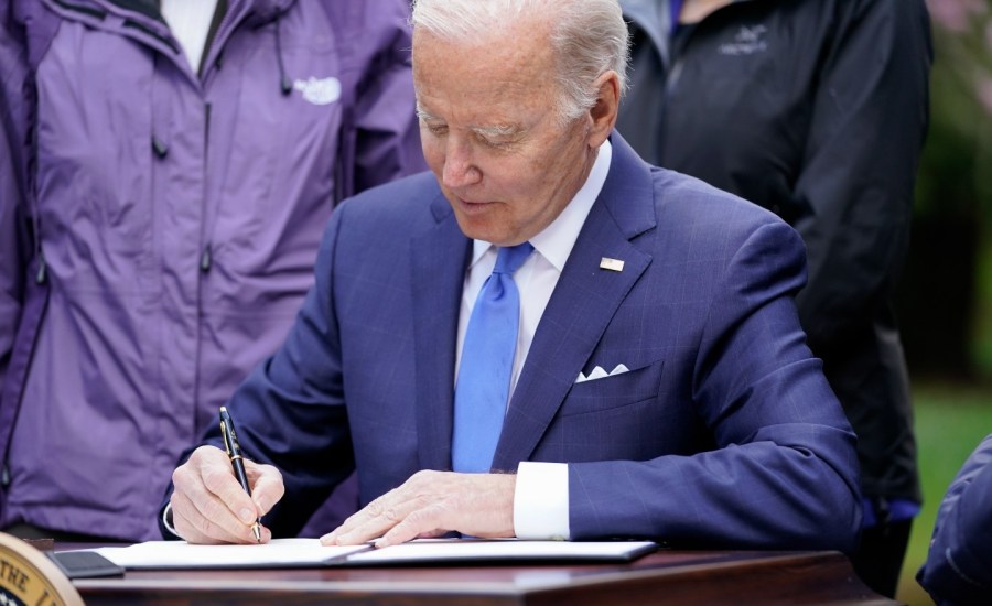 President Biden signs an executive order on Earth Day, 2022.