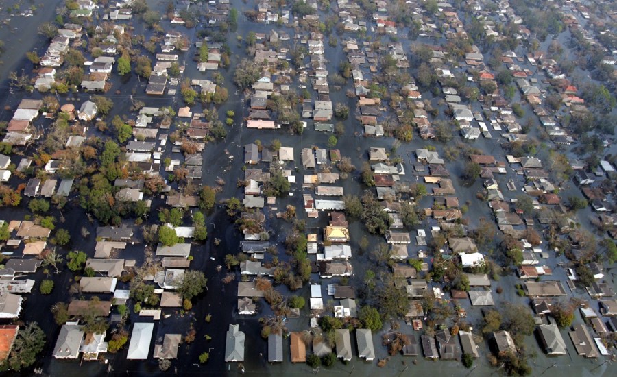 An aerial photo of New Orleans neighborhoods flooded following Hurricane Katrina in 2005.