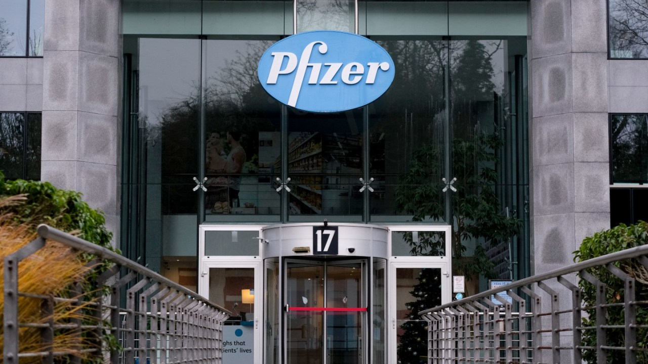 front of building with Pfizer sign above doors