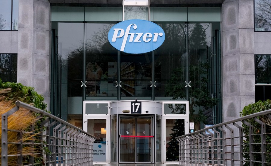 front of building with Pfizer sign above doors