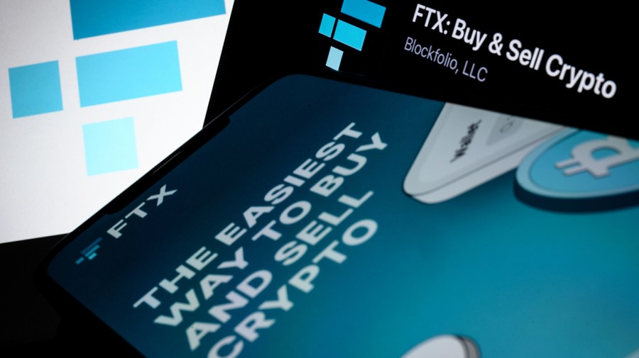 The FTX logo and mobile app adverts are displayed on screens