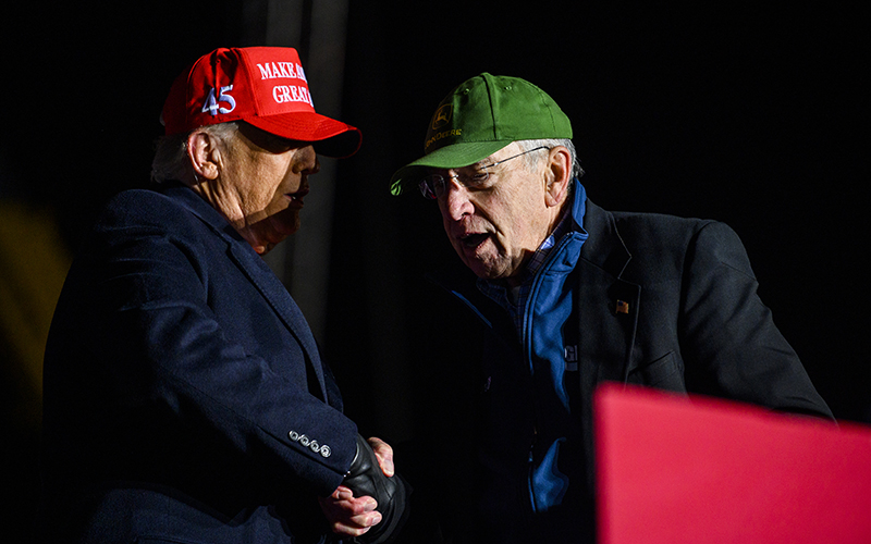 Sen. Charles Grassley (R-Iowa), right, joins former President Trump during a campaign event