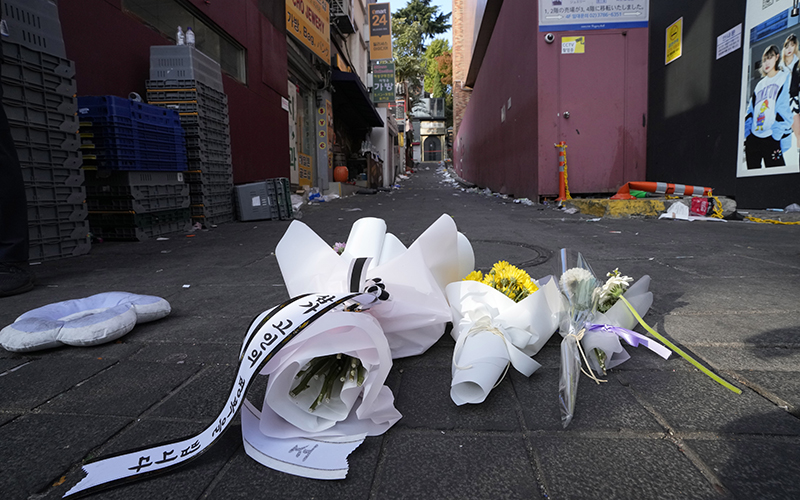 Flowers are seen at the scene of a deadly incident in Seoul, South Korea