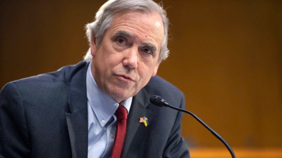 Senator Jeff Merkley speaks at a congressional hearing.