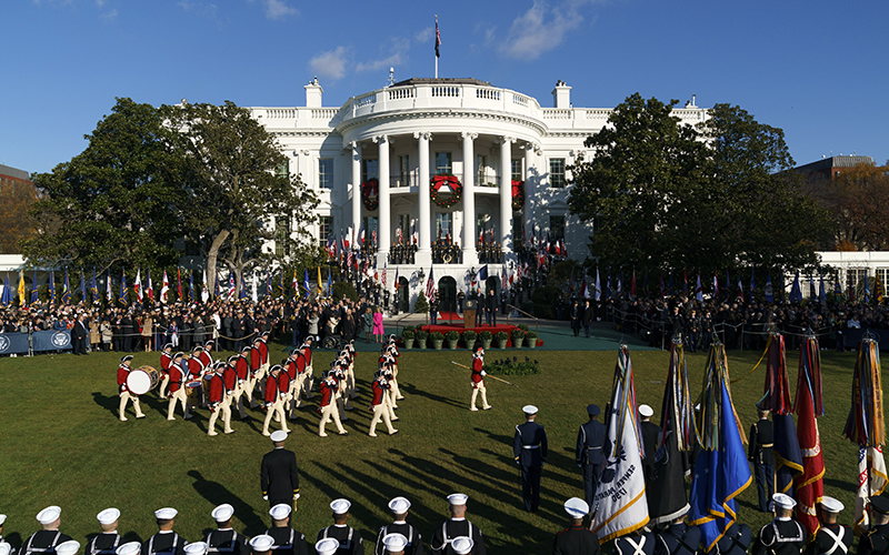 The Army Old Guard Fife and Drum Corp perform during an arrival ceremony