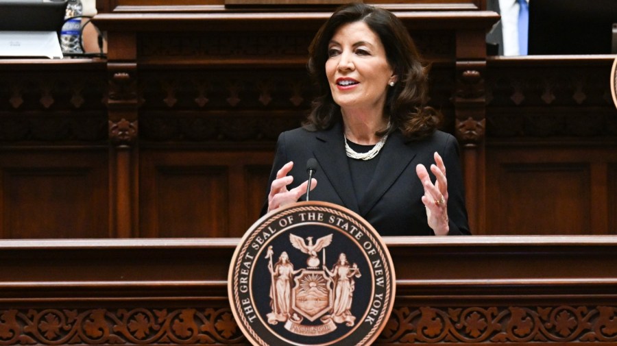 New York Governor Kathy Hochul gestures while giving a speech.