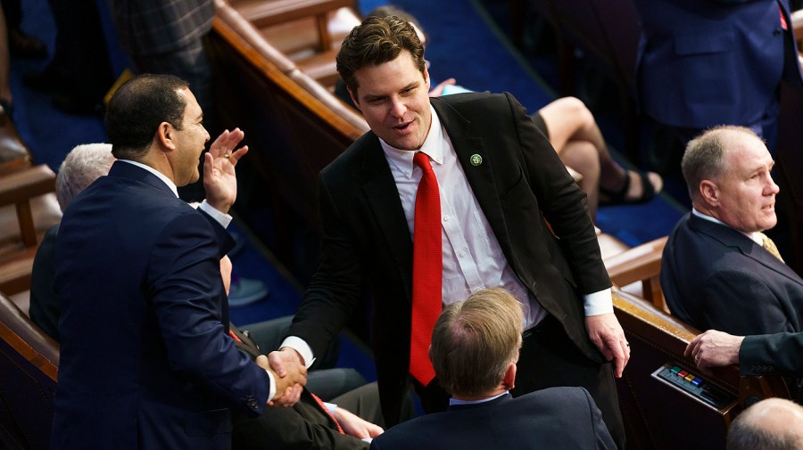 Rep. Matt Gaetz (R-Fla.) speaks with Rep. Henry Cuellar (D-Texas)