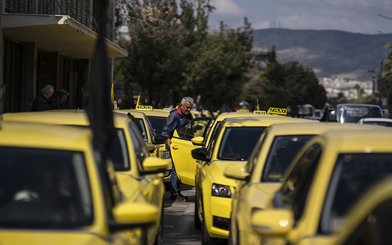 Taxi drivers participate in a 24-hour strike