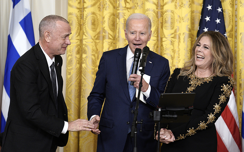 Actor Tom Hanks and his wife actress Rita Wilson react as President Biden hosts a reception celebrating Greek Independence Day