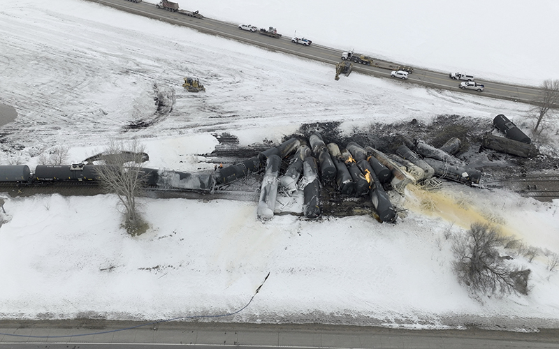 A BNSF train carrying ethanol and corn syrup derailed and caught fire in Raymond, Minn.