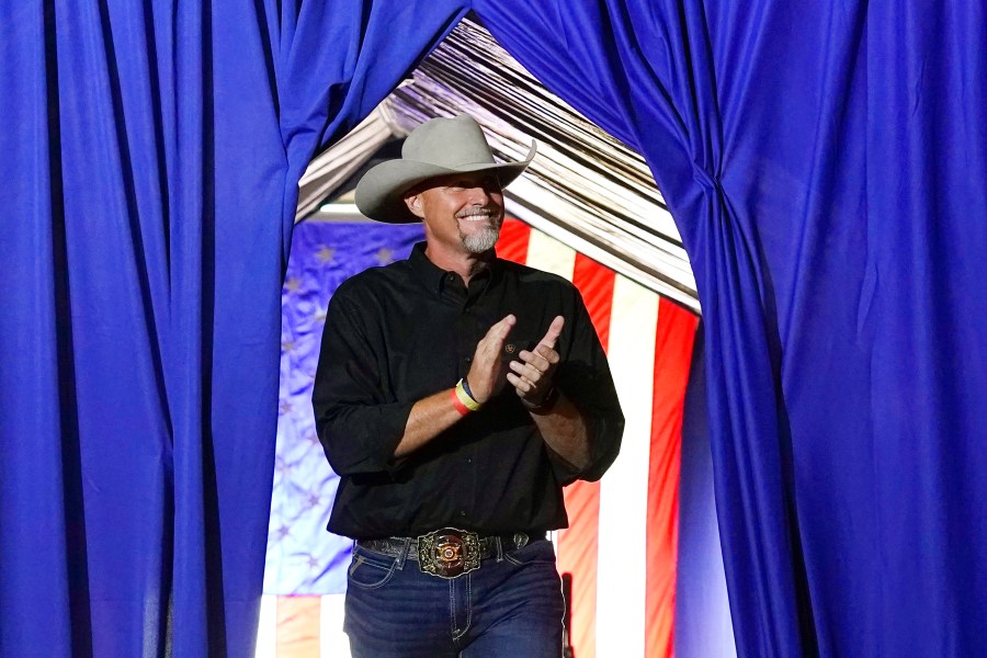 Pinal County sheriff Mark Lamb applauds as he walks on stage at a Save America Rally Friday, July 22, 2022, in Prescott, Ariz. Lamb has filed federal paperwork to run for the U.S. Senate in Arizona, Monday, April 10, 2023, becoming the first Republican to jump into a high-profile race for the seat now held by independent Sen. Kyrsten Sinema. (AP Photo/Ross D. Franklin)