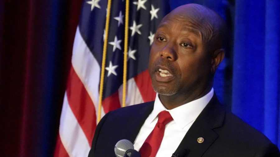 FILE - Sen. Tim Scott, R-S.C., gives a speech at a Black History Month dinner hosted by the Charleston County GOP on Feb. 16, 2023, in Charleston, S.C. Scott is taking the next official step toward a bid for president in 2024. The Republican is set to announce the formation of an exploratory committee, according to a person familiar with his plans who spoke with The Associated Press, Tuesday, April 11, 2023, on the condition on anonymity so as not to get ahead of the official announcement. (AP Photo/Meg Kinnard, File)