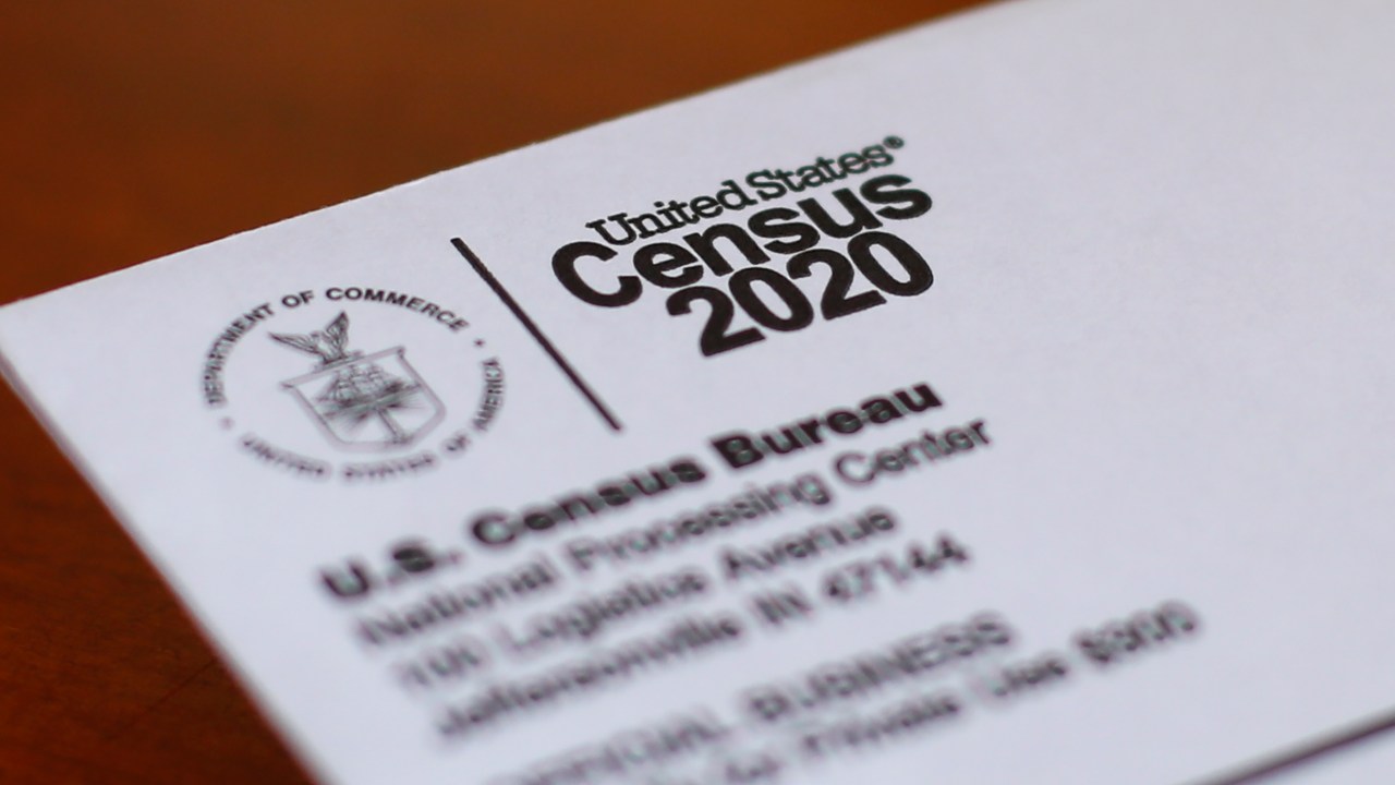 FILE - An envelope containing a 2020 census letter mailed to a U.S. resident sits on a desk on on April 5, 2020, in Detroit. A coding error in an annual survey by the U.S. Census Bureau has offered unprecedented insight into how large numbers of Brazilians in the U.S. identify as Hispanic. (AP Photo/Paul Sancya, File)