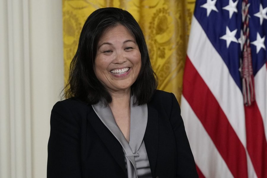 FILE - Julie Su, nominated by President Joe Biden to serve as the Secretary of Labor, listens as Biden speaks about her during an event in the East Room of the White House in Washington, Wednesday, March 1, 2023. Su, will testify to the Senate Thursday with key Democrats unwilling to voice support for her confirmation, creating uncertainty about her prospects in the narrowly-divided Senate. (AP Photo/Susan Walsh, File)