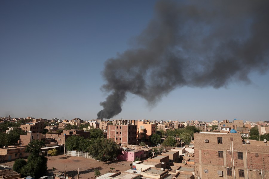 FILE - Smoke is seen in Khartoum, Sudan, Wednesday, April 19, 2023. Warring factions trying to seize control of the east African nation of Sudan have plunged the country into chaos, and thousands are fleeing the capital of Khartoum and nearby battle zones. Some countries, including the U.S., have shuttered their embassies and many are coordinating daring evacuations of their staffs and other residents in an array of convoys, flights and frantic getaway drives. (AP Photo/Marwan Ali, File)