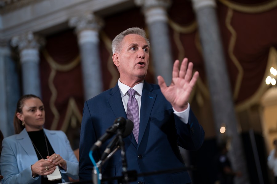 Speaker of the House Kevin McCarthy, R-Calif., talks to reporters just after the Republican majority in the House narrowly passed a sweeping debt ceiling package as they try to push President Joe Biden into negotiations on federal spending, at the Capitol in Washington, Wednesday, April 26, 2023. (AP Photo/J. Scott Applewhite)