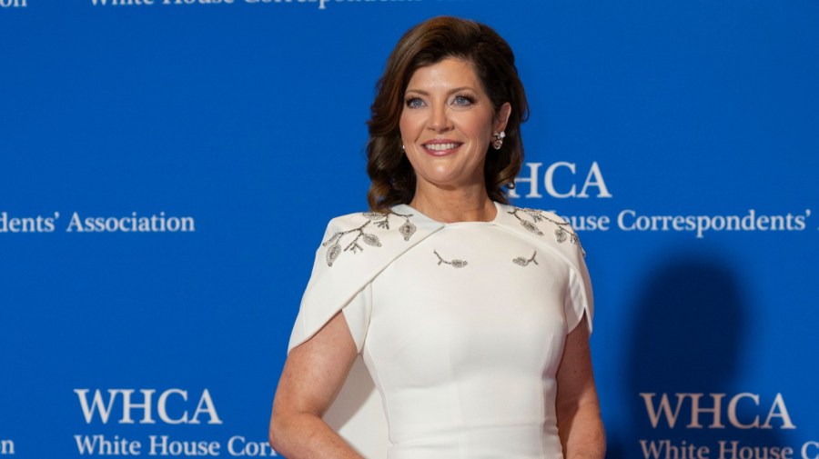 CBS anchor Norah O'Donnell poses for photographers as she arrives at the annual White House Correspondents' Association Dinner in Washington, Saturday, April 29, 2023.