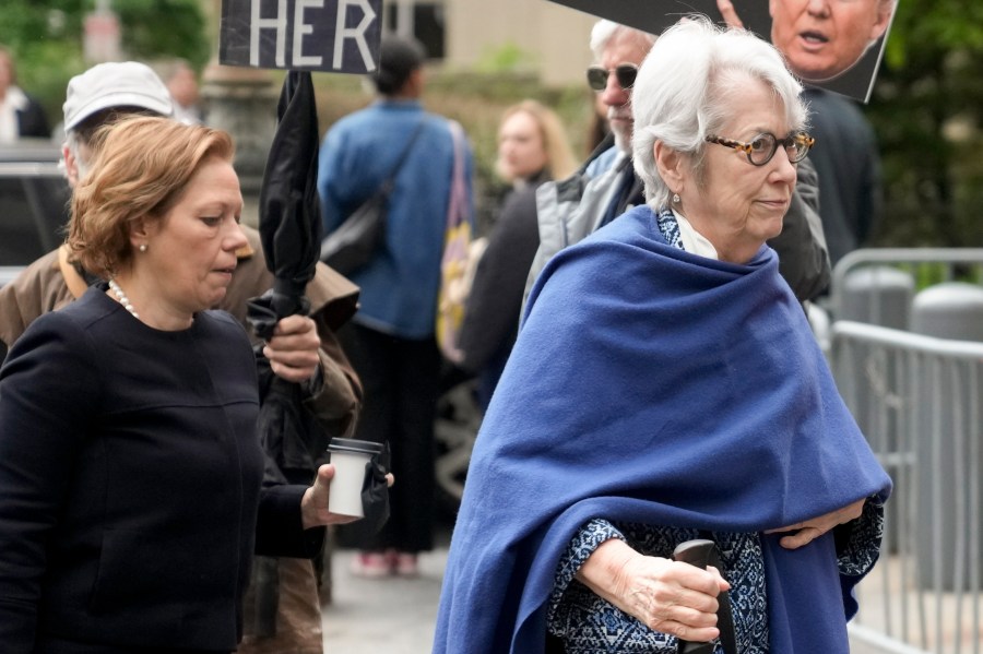 Jessica Leeds, right, arrives at federal court to testify as part of a lawsuit against former President Donald Trump in New York, Tuesday, May 2, 2023. (AP Photo/Seth Wenig)