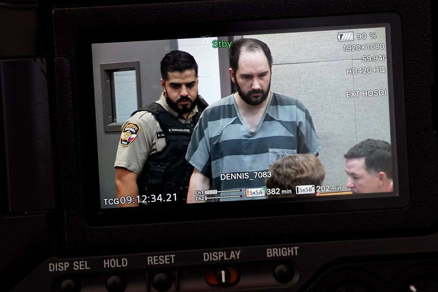 U.S. Army Sgt. Daniel Perry, who was convicted of murder for fatally shooting an armed protester in 2020 during nationwide protests against police violence and racial injustice, is seen on a pool video feed as he arrives for his sentencing hearing in Austin, Texas, Tuesday, May 9, 2023. (AP Photo/Eric Gay)