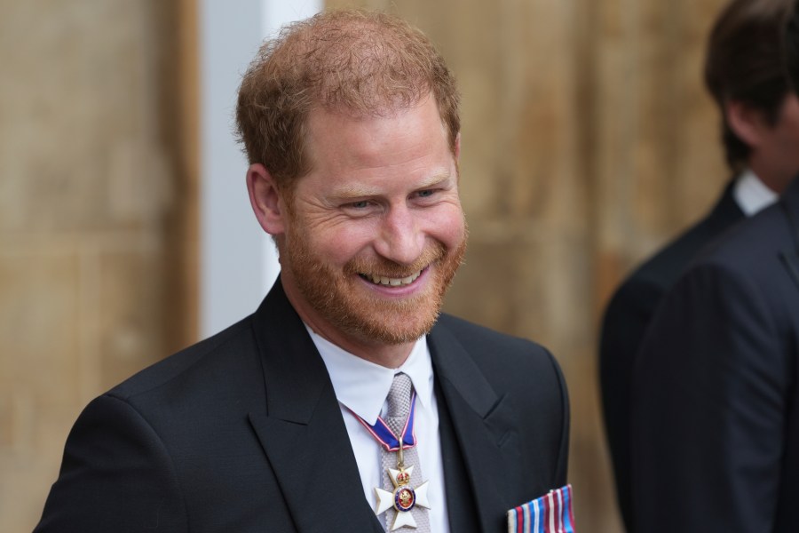 FILE - Prince Harry leaves Westminster Abbey after the Coronation of King Charles III in London, Saturday, May 6 2023. Prince Harry’s legal battle against the British press faces its biggest test yet and threatens to do something he said his family long feared: put a royal on the witness stand to discuss embarrassing revelations. (Dan Charity/Pool Photo via AP, File)