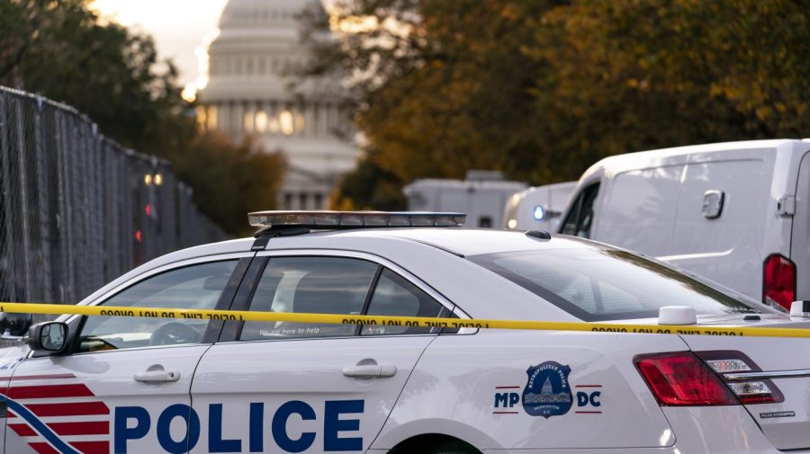 FILE - Washington Metropolitan Police investigate near the Supreme Court and U.S. Capitol in Washington, Oct. 19, 2022. President Joe Biden on Thursday - the third anniversary of George Floyd's murder - vetoed an effort led by congressional Republicans to overturn a new District of Columbia law on improving police accountability. (AP Photo/J. Scott Applewhite, File)