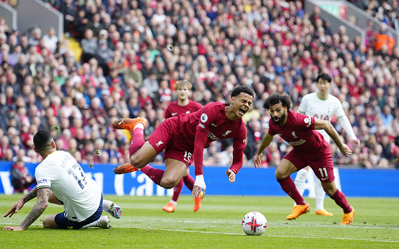 Liverpool's Cody Gakpo, center is fouled leading to a penalty for Liverpool