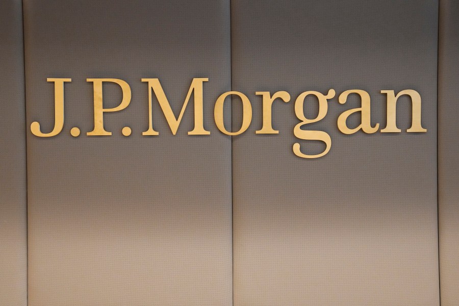 FILE - The logo of JPMorgan bank is pictured at the new French headquarters of JP Morgan bank, Tuesday, June 29, 2021, in Paris. JPMorgan Chase is defending itself against a lawsuit by the U.S. Virgin Islands accusing it of empowering Jeffrey Epstein to abuse teenage girls. Lawyers for the giant bank said in court papers Tuesday, May 23, 2023, that it was the islands that enabled the financier to commit his crimes. (AP Photo/Michel Euler, Pool, File)