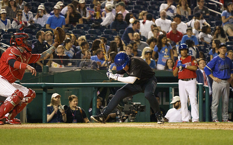 Rep. Mike Levin (D-Calif.) bats during the Congressional Baseball Game