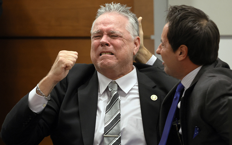 Former Marjory Stoneman Douglas High School Resource Officer Scot Peterson reacts as he is found not guilty