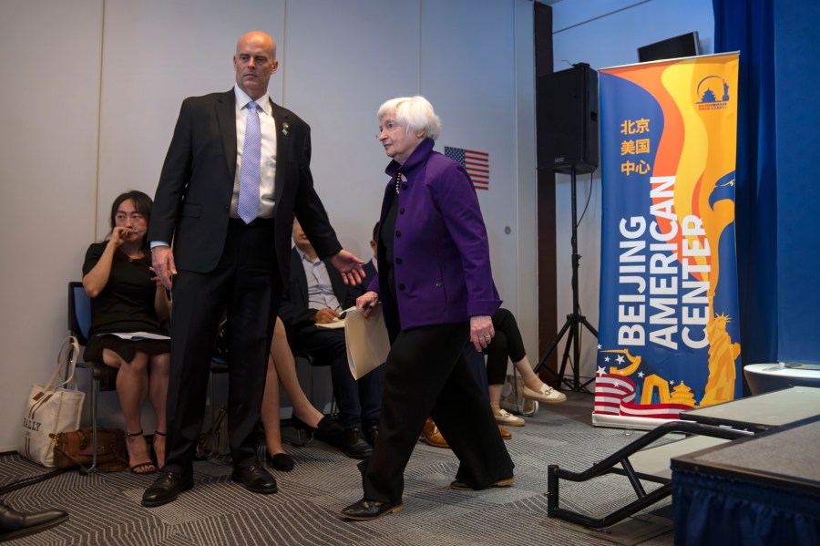 Treasury Secretary Janet Yellen leaves after a press conference at the U.S. Embassy in Beijing, China, Sunday, July 9, 2023. (AP Photo/Mark Schiefelbein)