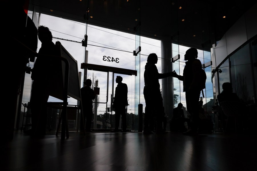 File - College students arrive for a job fair at Atlanta Tech Village, Wednesday, March 29, 2023, in Atlanta. On Tuesday, the Labor Department reports on job openings and labor turnover for June. (AP Photo/Alex Slitz, File)