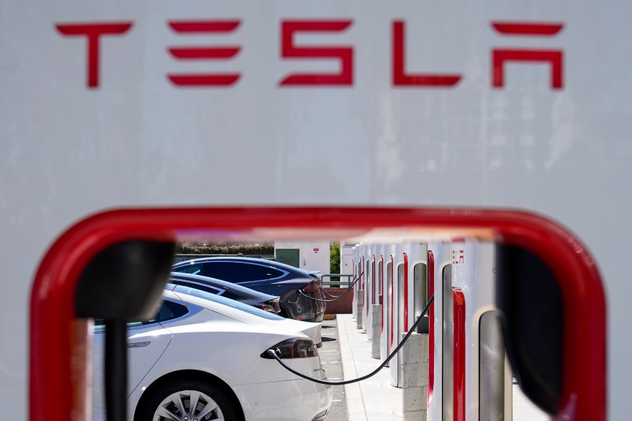 FILE - Tesla vehicles charge at a station in Emeryville, Calif., Aug. 10, 2022. In a document posted Tuesday, Aug. 1, 2023, U.S. auto safety regulators have opened another investigation into safety problems with Tesla vehicles concerning loss of steering control or loss of power steering in the 2023 Models 3 and Y electric vehicles. (AP Photo/Godofredo A. Vásquez, File)