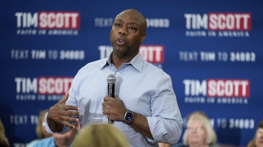 FILE - Republican presidential candidate Sen. Tim Scott, R-S.C., speaks during a town hall meeting, Thursday, Aug. 31, 2023, in Oskaloosa, Iowa. (AP Photo/Charlie Neibergall, File)