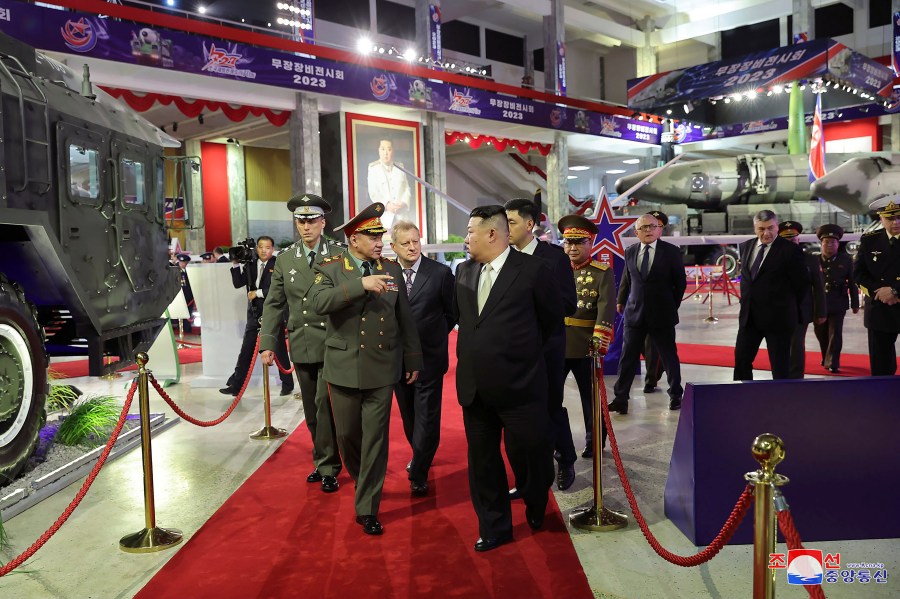 FILE - In this photo provided by the North Korean government, North Korean leader Kim Jong Un, center right, and Russian Defense Minister Sergei Shoigu, front left, visit an arms exhibition in Pyongyang, North Korea, on July 26, 2023. Independent journalists were not given access to cover the event depicted in this image distributed by the North Korean government. The content of this image is as provided and cannot be independently verified. Korean language watermark on image as provided by source reads: "KCNA" which is the abbreviation for Korean Central News Agency. (Korean Central News Agency/Korea News Service via AP, File)