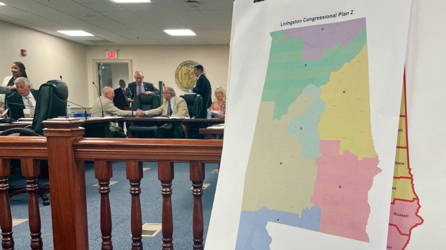 A map of a GOP proposal to redraw Alabama's congressional districts is displayed at the Alabama Statehouse in Montgomery, Ala.