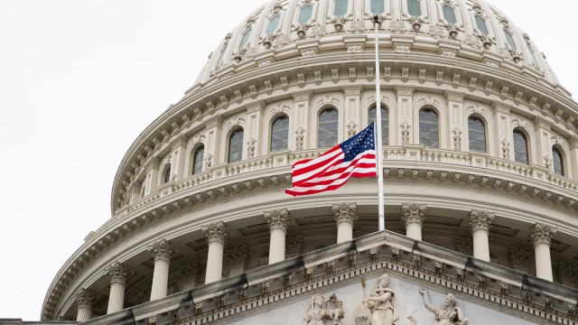 The American flag is seen at half-staff at the U.S. Capitol