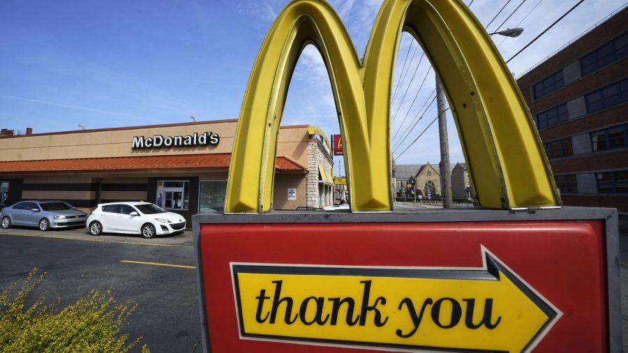 FILE - An exit sign is shown at a McDonald's restaurant in Pittsburgh, April 23, 2022. McDonald's reports earnings on Monday Oct. 30, 2023. (AP Photo/Gene J. Puskar, File)