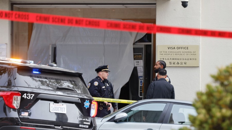 Emergency responders work outside the visa office at the Chinese Consulate building after a person drove into the building in San Francisco, Wednesday, Oct. 9, 2023.