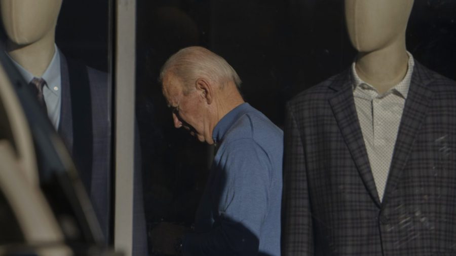 President Joe Biden is seen shopping inside Jos A. Bank in Greenville, Del.,Saturday, Nov. 18, 2023. (AP Photo/Manuel Balce Ceneta)